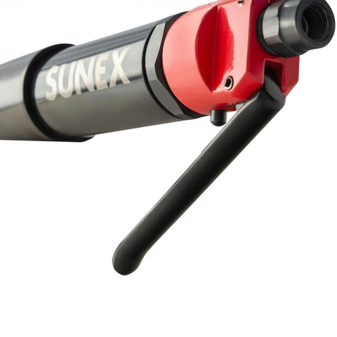 Close-up of Beast Heavy Duty Air Needle Scaler with metal casing and handle, designed for rust and paint removal on tough surfaces.