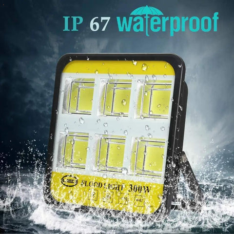 Gritproof Rechargeable Led Work Light With Solar Panel And Remote Control 200 Watt Waterproof Flood Lamp splashing in water with IP67 rating.