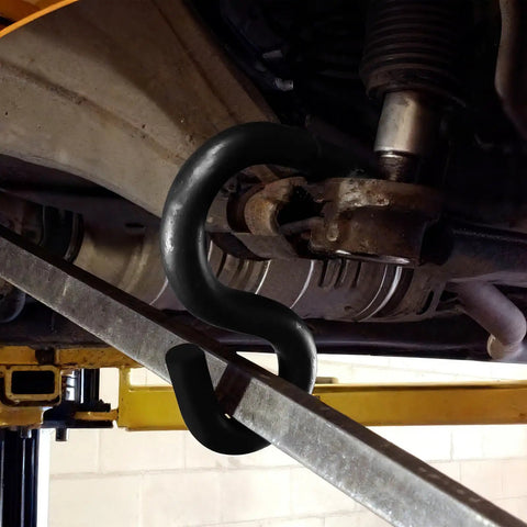 Lower Control Arm Prying Tool For Suspension Maintenance in use on vehicle, showing 0.875 inch diameter pry bar application.