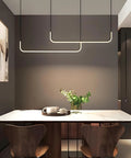 Modern Minimalist Linear LED Pendant Light For Kitchen Island And Dining Room Aluminum Island Fixture With Silica Gel Shade Bright 110 To 120V Lighting For Living Room And Hallways over dining table with chairs.