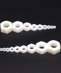 500 Piece Metric Nylon Hex Nuts Assortment Kit Featuring M2 Through M12 white plastic threaded fasteners displayed in various sizes.