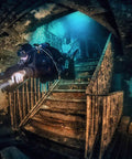 Scuba diver exploring a wreck wearing Zen Deluxe Single Tank Scuba BCD With Narrow Zen Wing For Superior Buoyancy Control.
