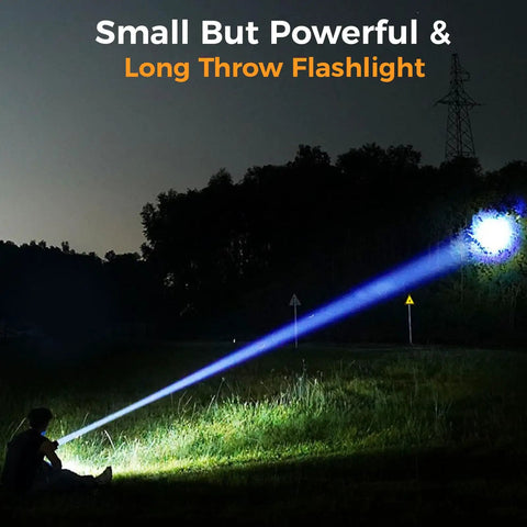 Night scene with Rechargeable Mini Magnet Flashlight 1200 Lumen Zoomable EDC Light illuminating a distant object