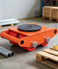 Heavy Duty Carbon Steel 360 Swivel Dolly Set For Moving Warehouse Machinery With Sturdy Rollers And Industrial Grade Skates For Factory Jobs on warehouse floor.