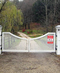 2 Pack Heavy Duty Private Property Signs No Trespassing Violators Will Be Shot on a white gated entrance to a private yard.