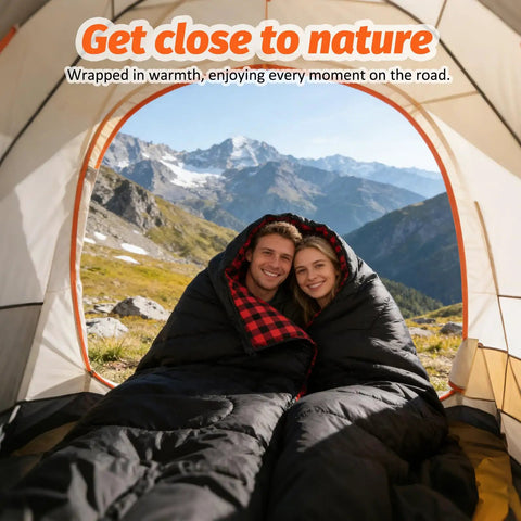 Couple in a tent using a Two Person Double Sleeping Bag With Two Pillows, Split Into Two Individual Bags Or One Queen Blanket.