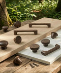 Top Shelf Mid Century Modern Walnut Mushroom Cabinet Knobs Slick Round Drawer Pulls displayed on wood surface, set of ten.