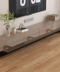 Beefed Up Thickened Black Heavy Duty Shelf Bracket With Screws supporting transparent shelf under TV