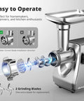 Close-up of Heavy Duty Electric Meat Grinder With Strainer And Tomato Sauce Press Maker showing blade installation details and grinding mechanism.