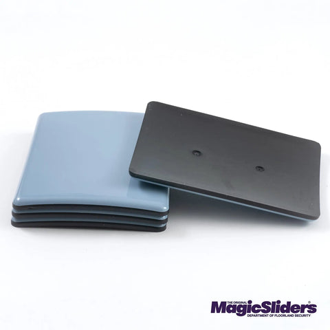 Heavy Duty Self Adhesive Furniture Slides Smooth Moving Discs No Sweat Floor Protectors For Gliding On Hardwood Tile Carpet And Vinyl Surface Savers Four Inch By Three Inch Four Pack Grey stacked together on white background.