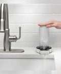 Straight Fire Stainless Steel Glass Rinser Built To Slide Right Into Your Kitchen Sink Dispenser Opening, rinsing a glass.
