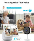 2K Indoor Security Camera for Home, Baby, Elder, and Pet Monitoring With Clear Night Vision next to smart display with Alexa command and child