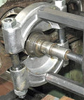 Pro Grade Bearing Separator Tool Heavy Duty Alloy Steel Universal Bearing Splitter for Cars in use on metal component