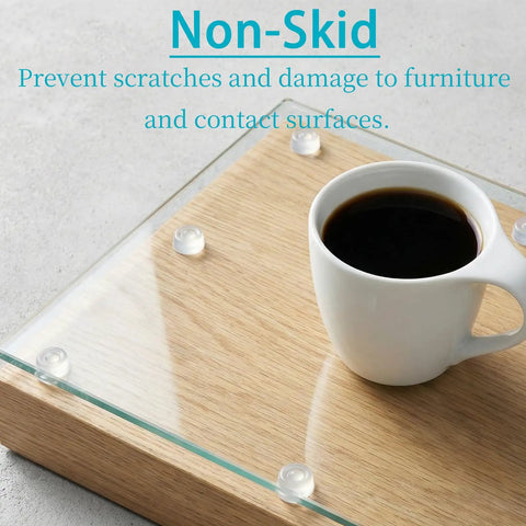 Straight Up Solid 164 Piece Pack Of Clear Self Adhesive Silicone Cabinet Door Bumpers And Furniture Protectors That Stop Door Slams Cold And Save Walls on wood surface.