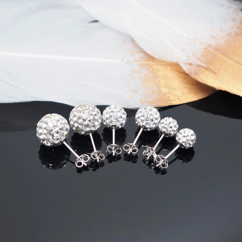 Sterling Silver 925 Pave Crystal CZ Diamond Stud Earrings For Women Sparkling Shamballa Ball Studs 6mm, set on black surface