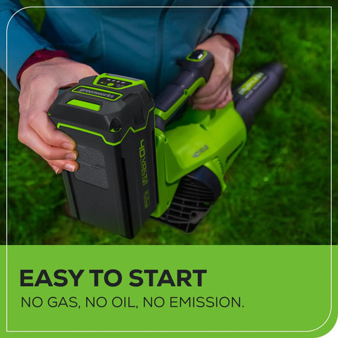 Person inserting battery into 40V Brushless Axial Leaf Blower, 130 MPH Wind and 550 CFM Air, Clears Wet Leaves, Gravel, and Driveway Snow