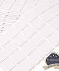Solid As A Rock Self Adhesive Felt Pads For Furniture 800 Pack white square pads arranged in sheets for chair and table legs.