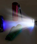 4 Pack Aluminum LED Flashlights Set With AAA Batteries Included And Pre Installed, one flashlight on, others in dark.