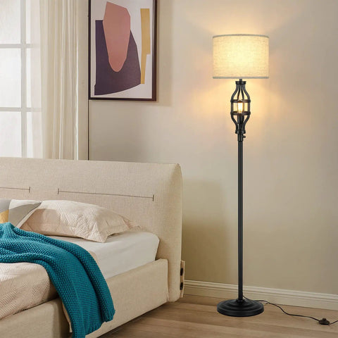 Black Farmhouse Floor Lamp With Night Light And Retro Vibe next to bed, vintage two light industrial pole with fabric drum shade and E26 Edison base.