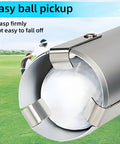 Close-up of Aluminum Alloy Golf Ball Retriever With Storage Bag, Detachable Pick Up Tube on grass, holds a golf ball securely.