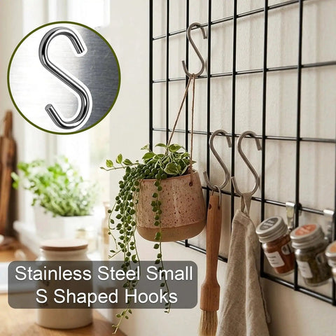 200 Piece 1 Inch Stainless Steel S Hooks For Curtain Hanging DIY Jewelry Pet Name Tags Key Rings Craft Assembly And Hella Versatile Mini Hardware Connector Clips on a wall display.