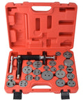 Front view of a pneumatic brake caliper tool kit in an orange case, with round metal dies and pistol-grip air tool.
