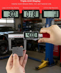 Digital Disc Brake Rotor Micrometer With 0 To 50mm Range And 0 To 2 Inch Readout Heavy Duty Pro Grade Digital Caliper MM Inch Display IP54 Waterproof Stainless Steel For Auto Repair And DIY Projects in use, showing LCD display.
