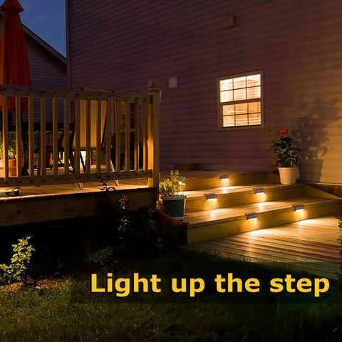Solar Deck Lights Outdoor 16 Pack Lit Warm White LED Step Lights on deck stairs and railing at night