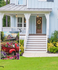 Welcome Spring Summer Red Truck Garden Flag displayed on porch in front of house with flowers and dog, 28x40 double-sided premium linen.