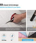 Close-up of cutting foam in 20 Pack 115 Sq Ft 3D Faux Brick Panels Peel And Stick White Wall Decor for DIY Renovation