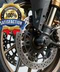 Motorcycle front wheel with brake disc and "Guaranteed 100% Satisfaction" badge overlay