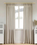 Gold Curtain Rods For Windows 66 To 120 Inches, 1 Inch Adjustable, displayed with beige curtains in a modern living room.