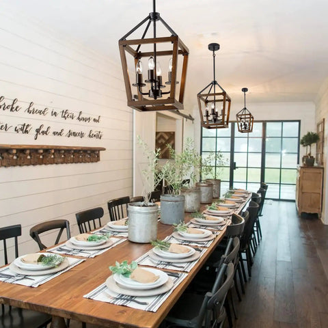 Rustic Farmhouse 4 Light Pendant Chandelier With Imitation Oak Wood Grain hanging over dining table, open cage style