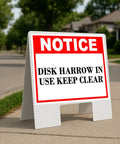 Keep Clear Notice Sign Folding A-Frame, Double-Sided 23x23 Inch Coroplast Display on a sidewalk with grass, outdoor use.