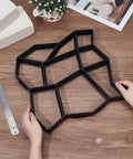 Hands holding 2 Pack Concrete Path Molds For Walkways And Patios 14.17x14.17x1.38 Inch Square Stone Pattern Reusable Forms