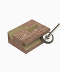 Extreme Rotor Saw Burr Wood Carving Bit, One Eighth Inch Shaft, Very Coarse Grind rotating against wooden block