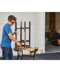 Man using 20V Max Sheet Sander with 12,000 OPM for fast material removal on a wood project outdoors
