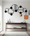 Abstract Metal Wall Hanger With Geometric Coat Hooks, Killer Wall Art For Entryway, Modern Silver Coat Rack Organizer, Smooth Operator Hat Stand Holder 53x26 Inches on wall with bags and hat.
