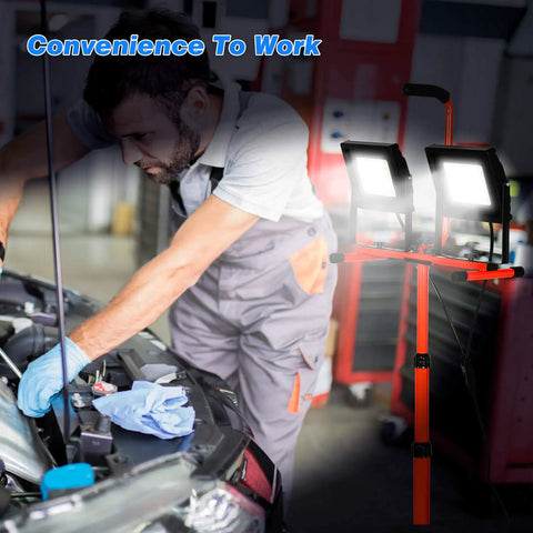 Mechanic using Beast Bright LED Work Light Kit With Retractable Tripod And Dual Head 10000 Lumen Output 100W in garage