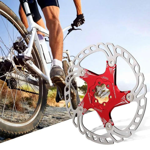 Heavy Duty Mountain Bike Brake Pads 203mm Disc Pads Built With A Sick Five Nail Layout For Fire Stopping Power And Smooth Hydraulic Or Mechanical Setup For Trail Shredding Bold Red, detail of brake disc with cyclist.
