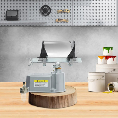 Solid As A Rock Air Operated Paint Shaker Heavy Duty Adjustable Clamp Agitator Mixer on a wooden surface with paint cans.