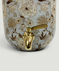 Floral detail of Blue Enamel Copper Water Dispenser With Lid And Tap Handmade Indian Pot for drinking water storage.