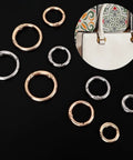 16 Pcs Mini O Ring Clip Spring Carabiner Set For Bags And Purses And Handbags, Round Gold And Silver O Rings And Clasps, Four Sizes For DIY Jewelry Making And Craft Projects; assorted gold and silver alloy rings on black