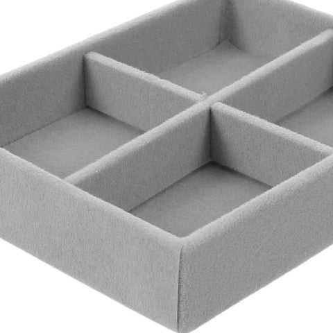 Velvet Jewelry Organizer Tray With Four Grid Compartments Stackable Minimalist Ring And Bracelet Tabletop showing soft gray material and compartments.