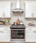 Kitchen cabinets with 10 Pack 5 Inch Cabinet Handles In Champagne Bronze For Kitchen And Dresser Drawers installed above a stove.