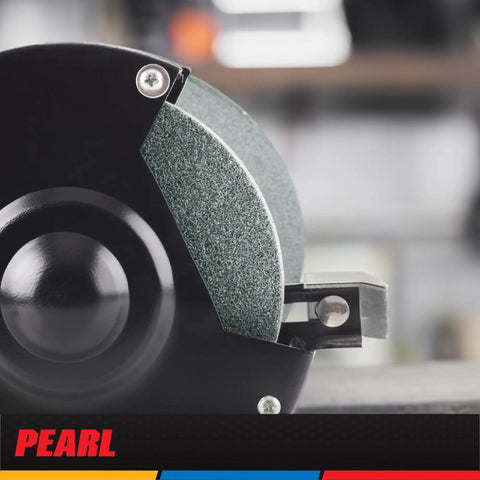 Close-up of 6X1X1 C120 General Purpose Bench Grinding Wheel for Metal, Pro Grade Green Silicon Carbide, mounted on grinder.