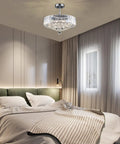 Raindrop Crystal Chandelier With Five Lights, Round Pendant Ceiling Light That Pops in bedroom setting, 16 Inch Chrome Fixture