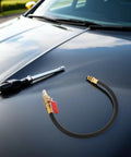 Top Rated Premium Boss Level European Cylinder Pressure Hose Rubber Alloy For Engine Leak Test Quick Connect No Leak Setup Fits Air Compressor And Auto Diagnostic Tools Easy Install Heavy Duty Performance For Garage Crew black hose with brass quick-connect fitting on car hood