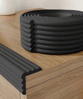Heavy Duty Baby Proof Corner Guards And Edge Shields For Sharp Tables And Fireplaces Hella Comfy Foam Bumpers With Zero Residue Tape For Stress Free Living Rooms And Little Rascals Everywhere Black on furniture edge.