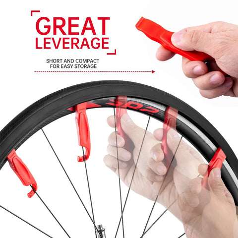 Three Pack Bicycle Tire Levers For Road And Mountain Bikes Heavy Duty Self Lubricating Plastic Rim Safe Levers For Quick Easy Tire Removal Tool Without Scratching Rims in use for removing a tire.